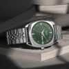 Ajanta Quartz Green Dial Silver Analog Watch for Men – Stainless Steel Strap with Day & Date Display | AWC132ESG/3